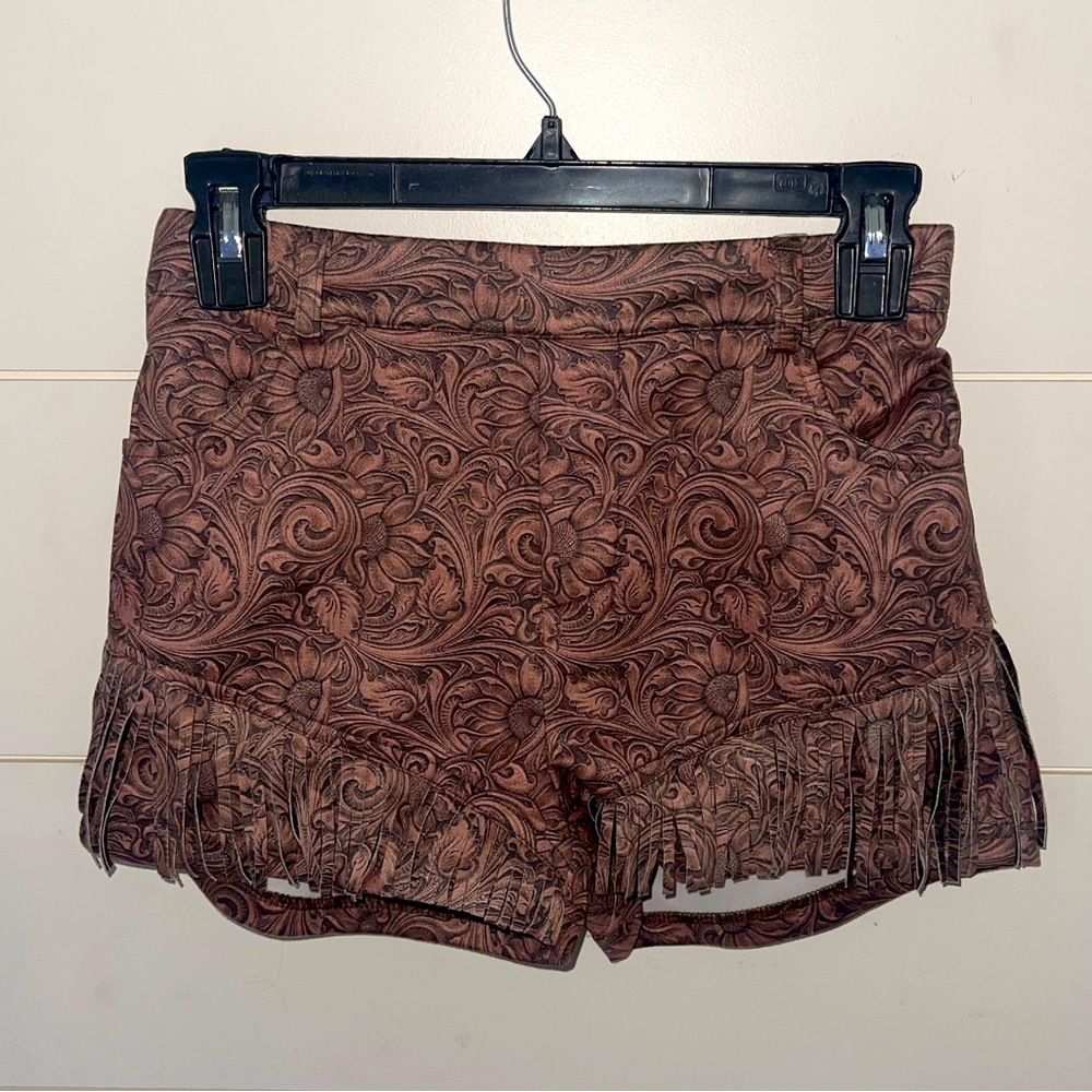Western fringe tooled leather design shorts size XS
NEW